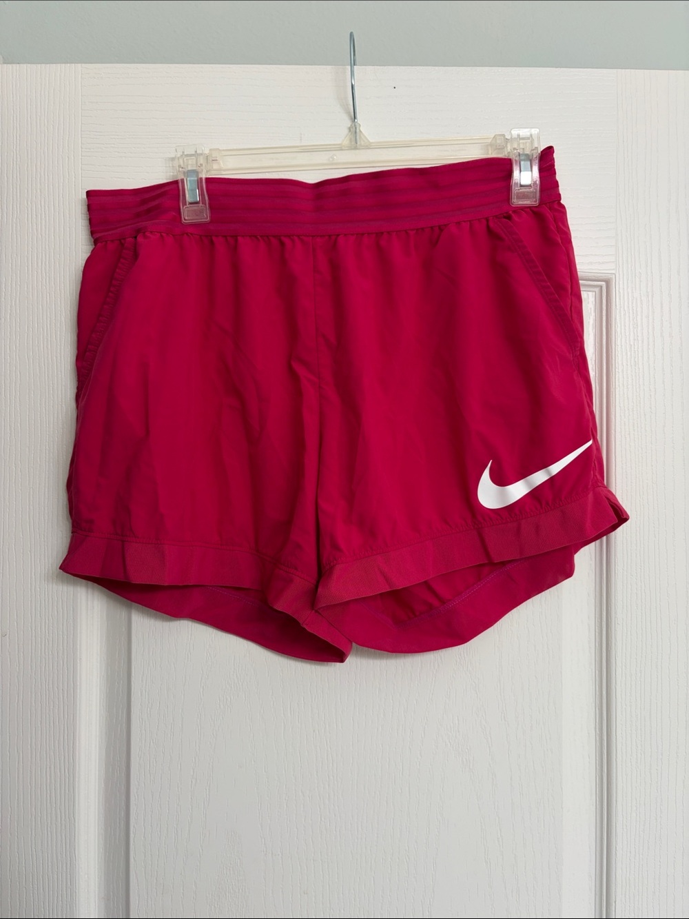 Nike Women’s Hot Pink Running Shorts with White Swoosh